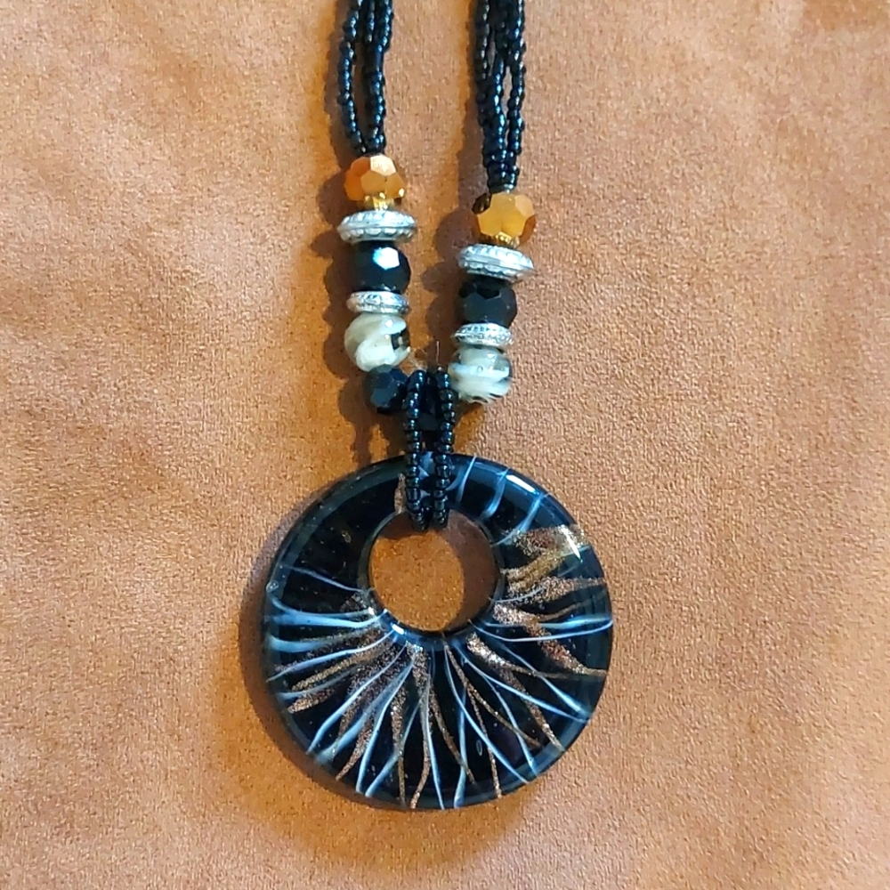 Artistic Pendant on Beaded Necklace